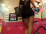 Super hawt mulatto babe at the store in her super short skirt